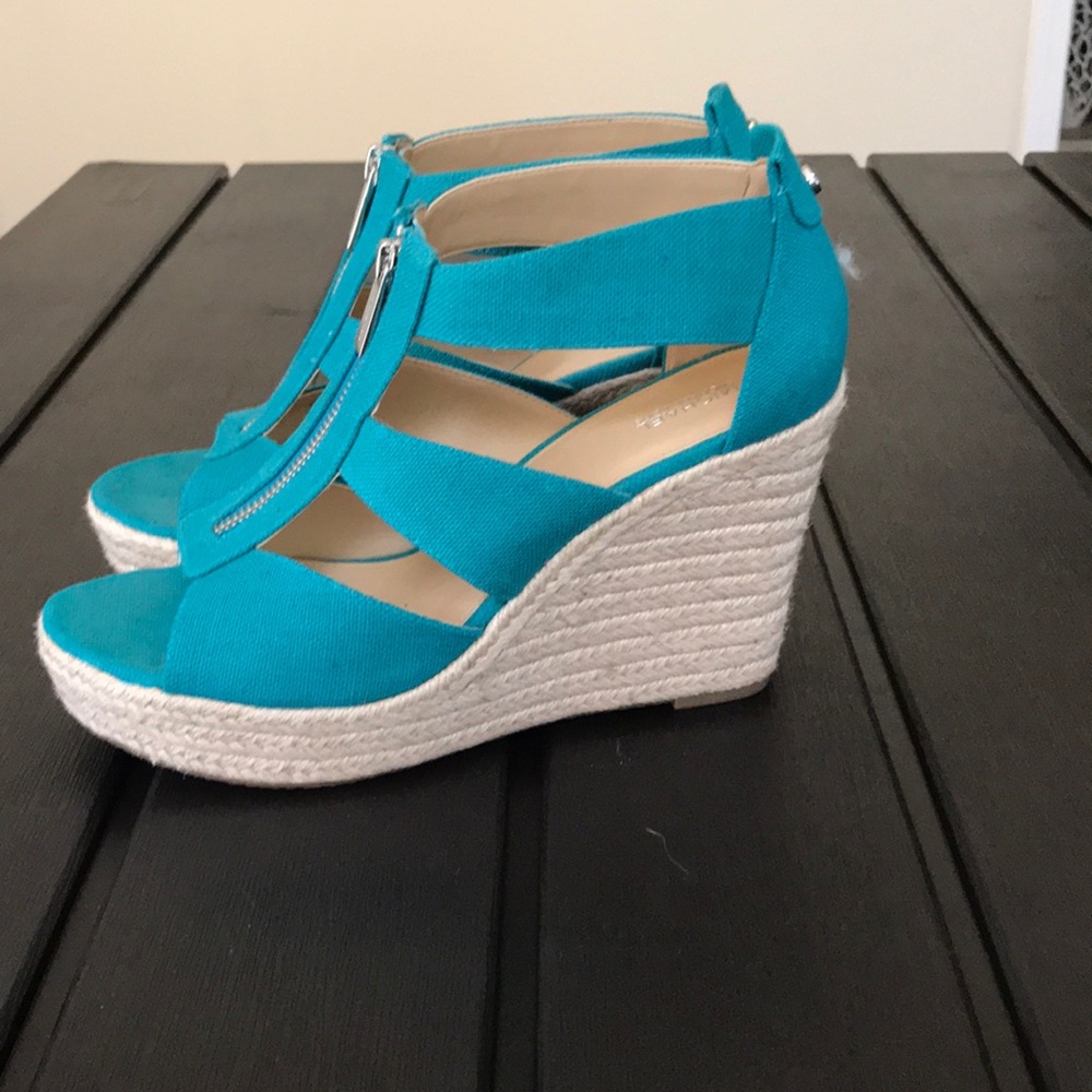 Michael Kors open toe, zip close, wedge heels.